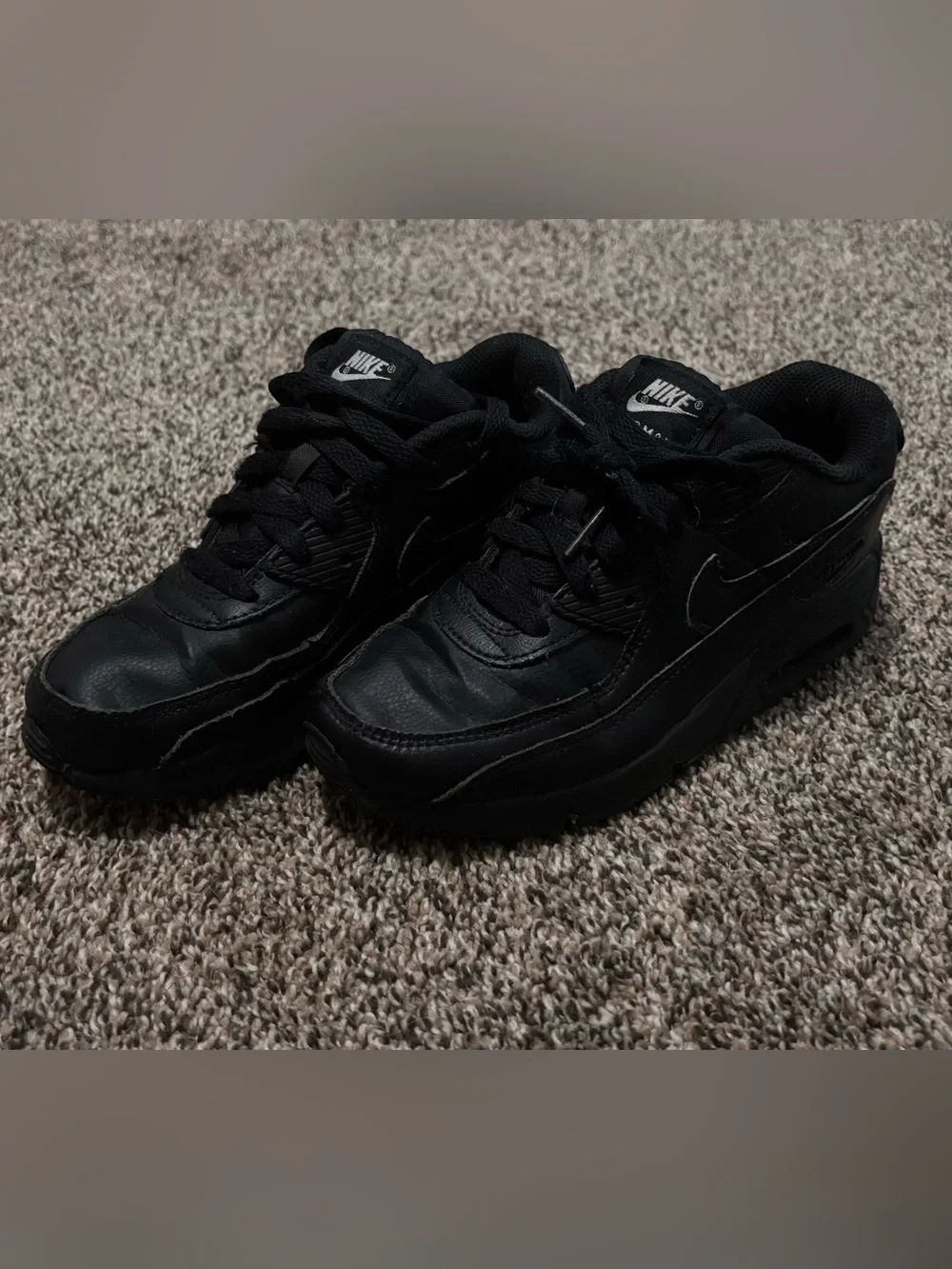 Nike Kids Black Low-Top Sneaker with Subtle Swoosh